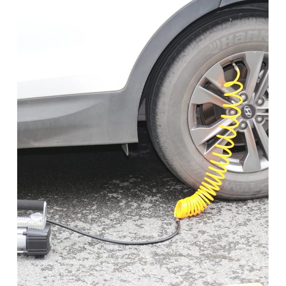 Inflador de neumáticos para coche con pies de goma para estabilidad