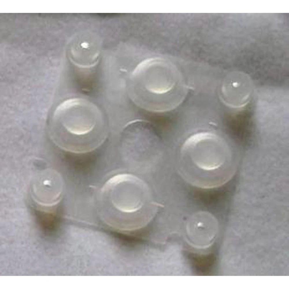 PSP2000 styrkors gummidyna för reparation av PSP 2000-konsoler