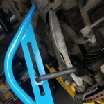 Detalle de la varilla de separación para reparación de suspensión automotriz